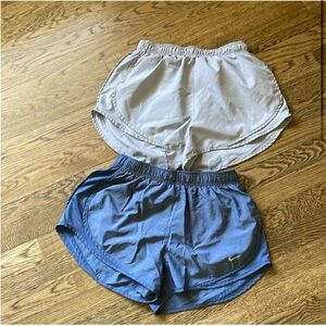 Two pairs of women’s Nike Dri-Fit shorts, size medium